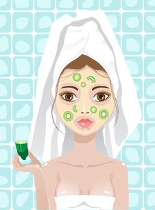 Girl With Cucumber And Kiwi Facemask Royalty Free Stock Photography Girl With Cucumber And Kiwi Facemask Royalty Free Stock Photography