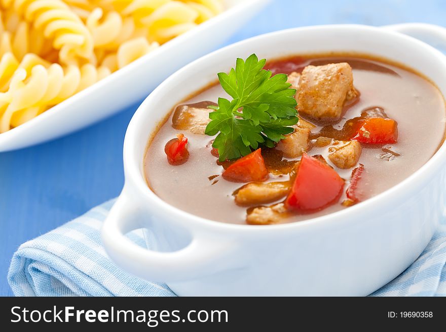 Fresh goulash with pepper and pasta