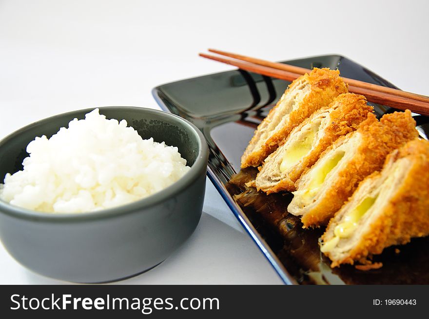 Deep fried roll pork with cheese.