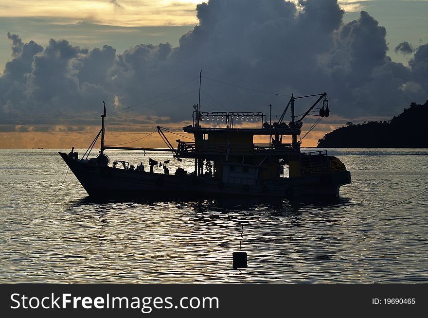 Late evening and a silhouette of fishing boats, at the seaside of Kota Kinabalu Sabah, Malaysia. Late evening and a silhouette of fishing boats, at the seaside of Kota Kinabalu Sabah, Malaysia