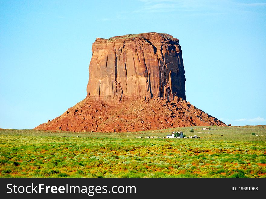 A big rock in the green monument valley. A big rock in the green monument valley