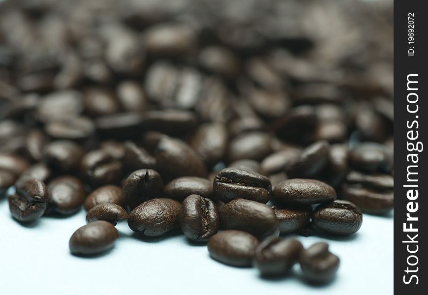 Closeup of pile of coffee beans