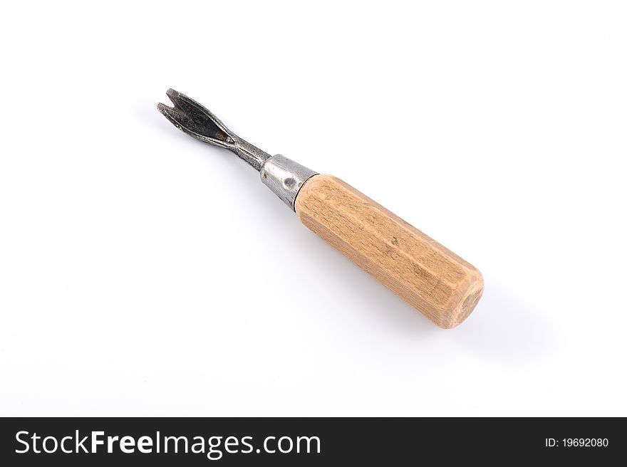 Old fashioned upholsterer tool for nails