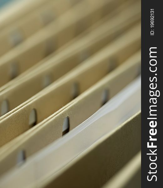 Closeup of a row of file folders