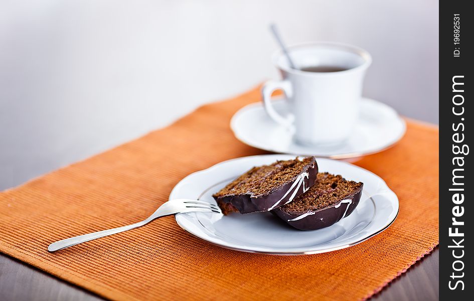 Chocolate cake and cup