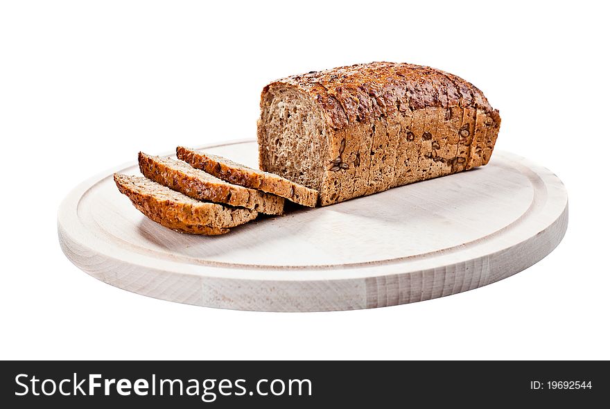 Bread on cutting board isolated on white