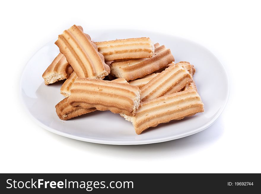 Plate of cookies isolated on white