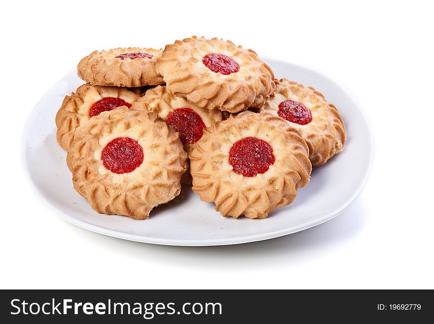 Plate of marmelade chip cookies on white