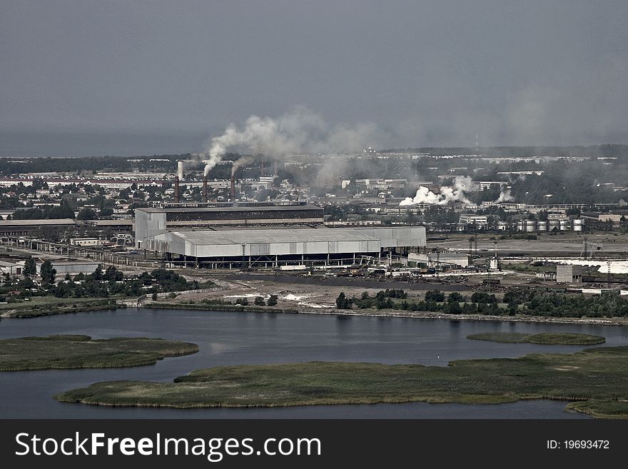 Aerial view of industrial area by the sea. Aerial view of industrial area by the sea.