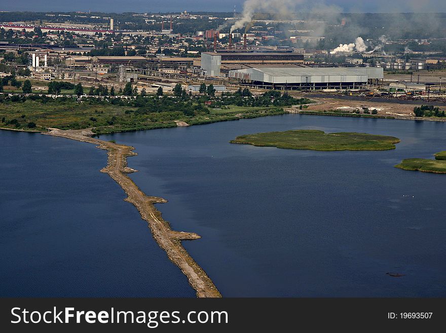 Aerial view of industrial area by the sea, city Li