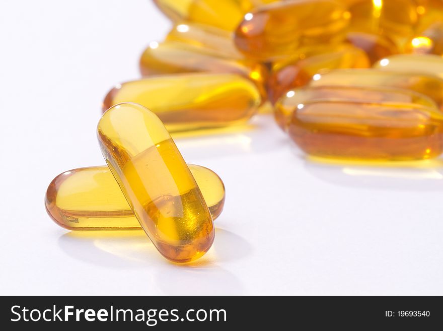 Yellow Pills Vitamin Soft Gels - fish oil. Yellow Pills Vitamin Soft Gels - fish oil