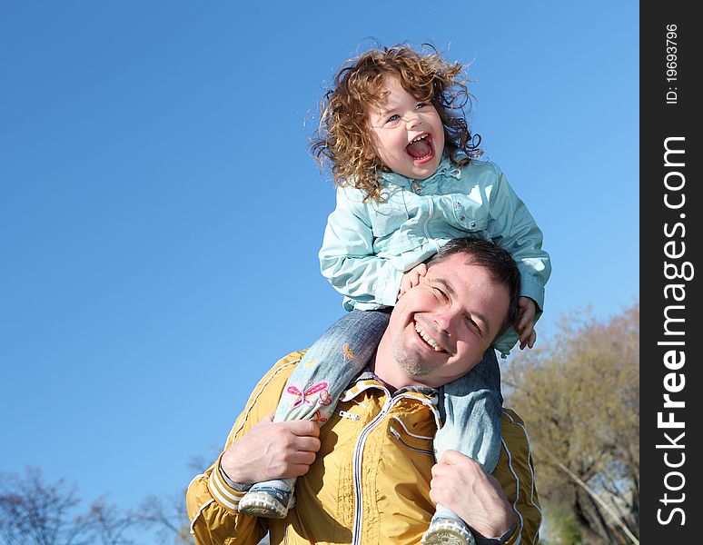 Litlle Girl With Father In The Park