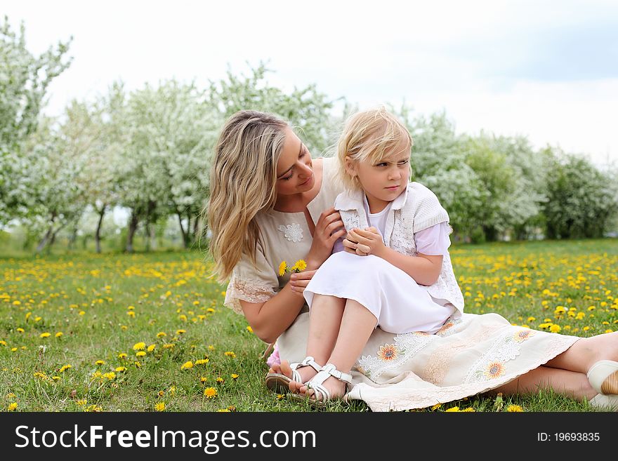 Girl with mother in the park