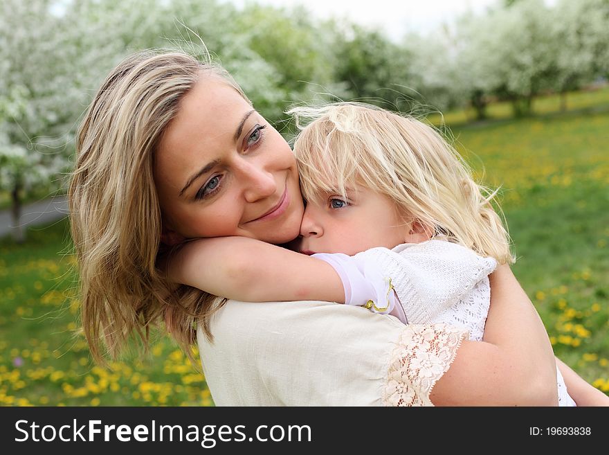 Girl with mother in the park