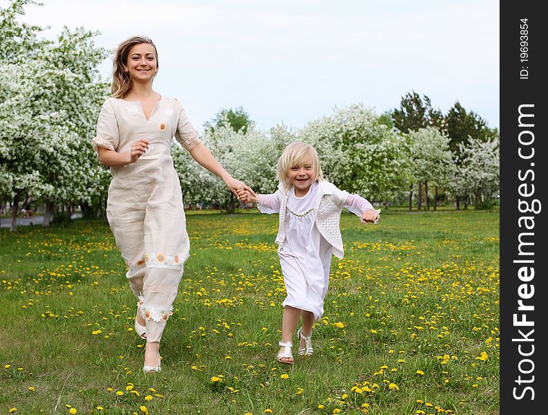 Girl With Mother In The Park