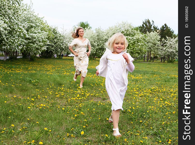 Girl With Mother In The Park