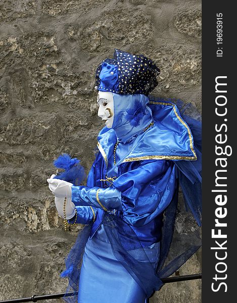 A portrait of one of the most beautiful masks photographed in open street during venetian carnival. A portrait of one of the most beautiful masks photographed in open street during venetian carnival.