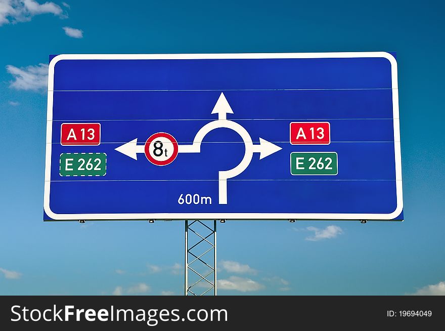 Traffic signs on background sky