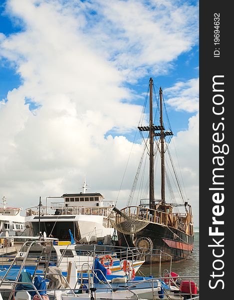 Yachts And Fishing Boats At Pier