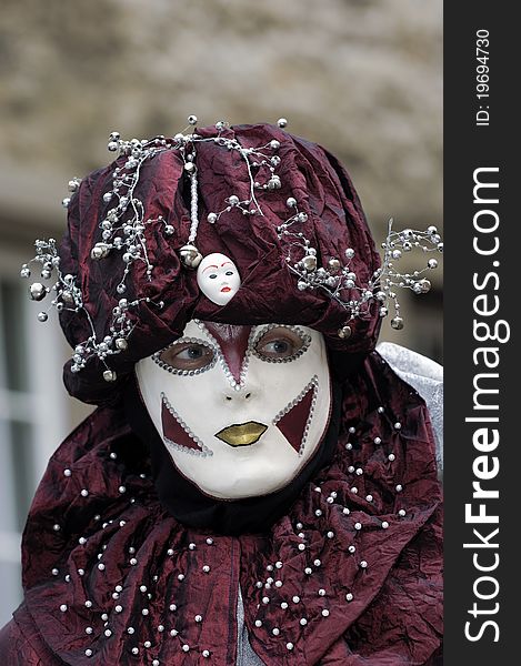 A portrait of one of the most beautiful masks photographed in open street during venetian carnival. A portrait of one of the most beautiful masks photographed in open street during venetian carnival.