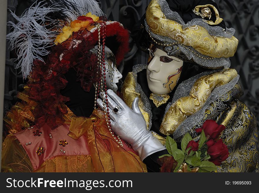 A portrait of one of the most beautiful masks photographed in open street during venetian carnival. A portrait of one of the most beautiful masks photographed in open street during venetian carnival.