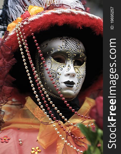 A portrait of one of the most beautiful masks photographed in open street during venetian carnival. A portrait of one of the most beautiful masks photographed in open street during venetian carnival.