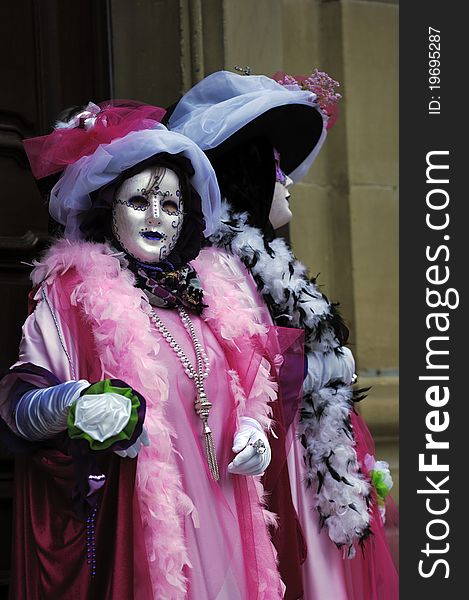 A portrait of one of the most beautiful masks photographed in open street during venetian carnival. A portrait of one of the most beautiful masks photographed in open street during venetian carnival.