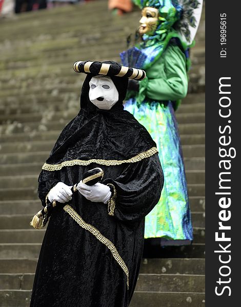 A portrait of one of the most beautiful masks photographed in open street during venetian carnival. A portrait of one of the most beautiful masks photographed in open street during venetian carnival.