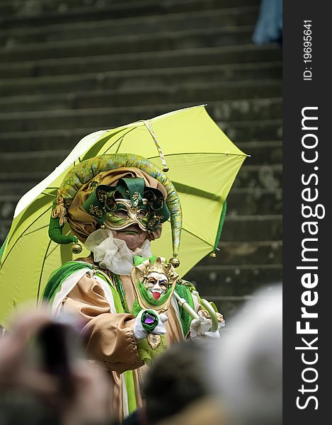 A portrait of one of the most beautiful masks photographed in open street during venetian carnival. A portrait of one of the most beautiful masks photographed in open street during venetian carnival.