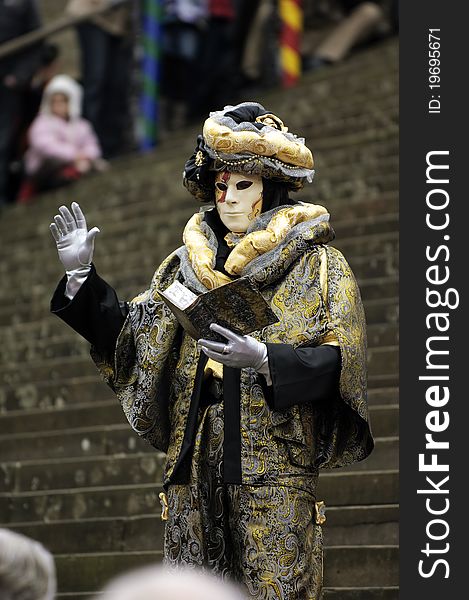 A portrait of one of the most beautiful masks photographed in open street during venetian carnival. A portrait of one of the most beautiful masks photographed in open street during venetian carnival.