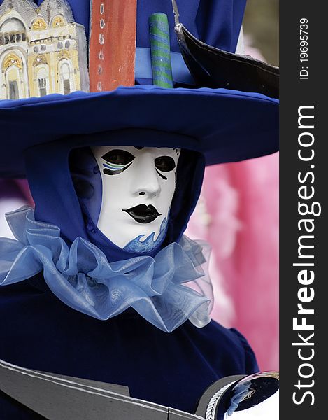 A portrait of one of the most beautiful masks photographed in open street during venetian carnival. A portrait of one of the most beautiful masks photographed in open street during venetian carnival.