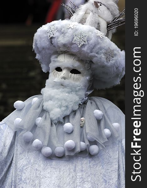 A portrait of one of the most beautiful masks photographed in open street during venetian carnival. A portrait of one of the most beautiful masks photographed in open street during venetian carnival.