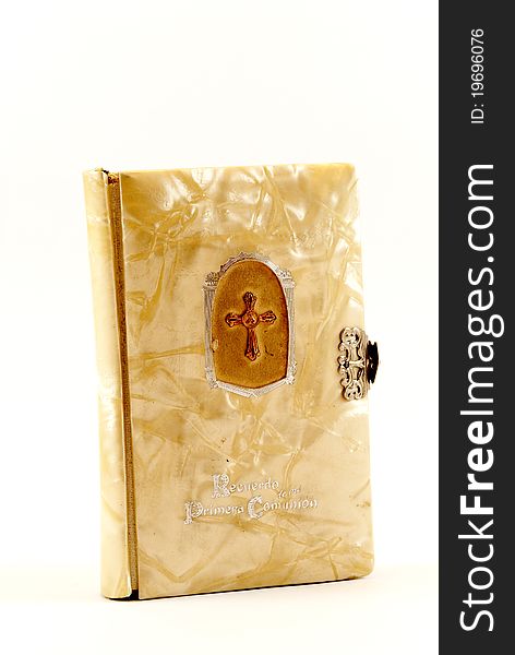 Book of Catholic communion isolated on white background