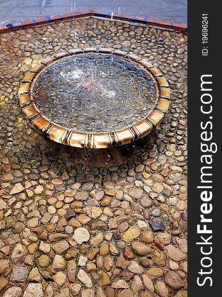 Fountain detail. Palm garden park in Alicante, Spain.