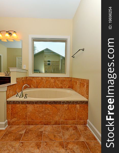 Well trimmed garden tub in luxury home