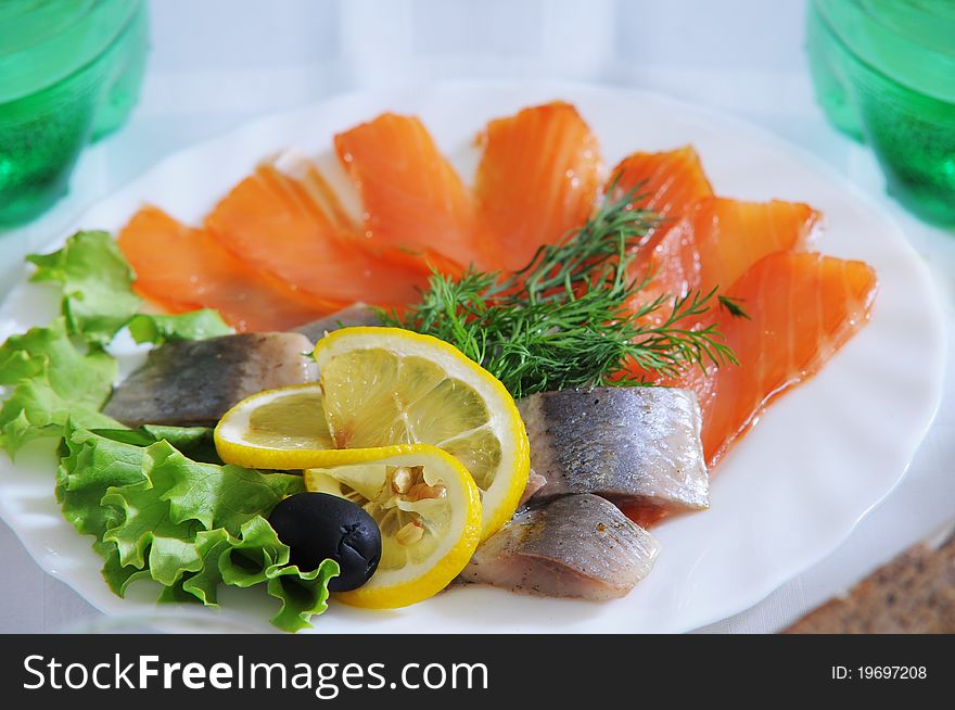 Fillet of a herring and salmon with a lemon and fennel. Fillet of a herring and salmon with a lemon and fennel.
