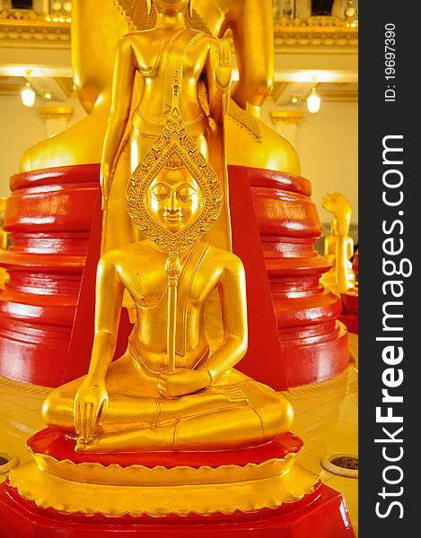 Golden buddha statue at thai temple