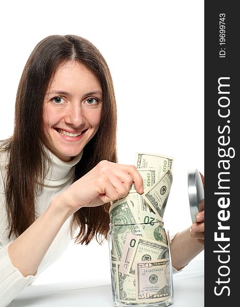 Young Woman Taking Dollars From A Jar