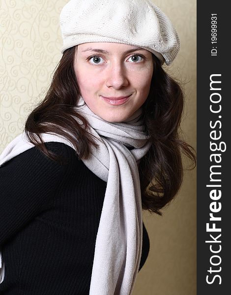 Studio portrait of a beautiful young woman wearing beret