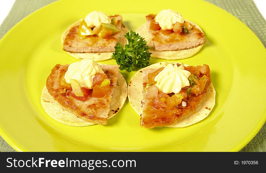 Chicken tarts served on tortillas with mayonaise. Chicken tarts served on tortillas with mayonaise
