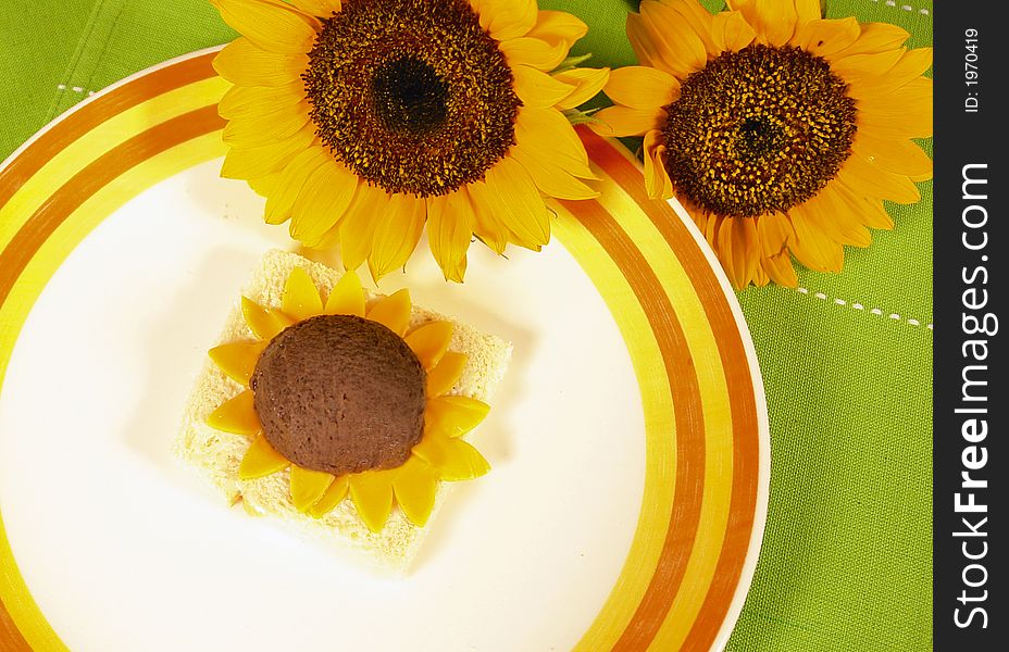 Black bean dip served as a sunflower on white bread and with cheese. Black bean dip served as a sunflower on white bread and with cheese