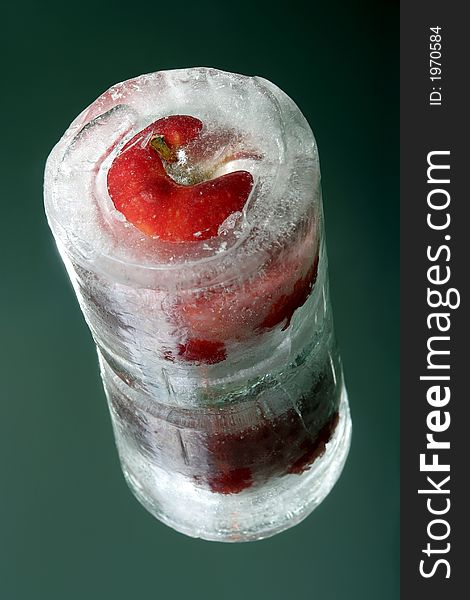 Apple covered with thick layer of ice. Apple covered with thick layer of ice