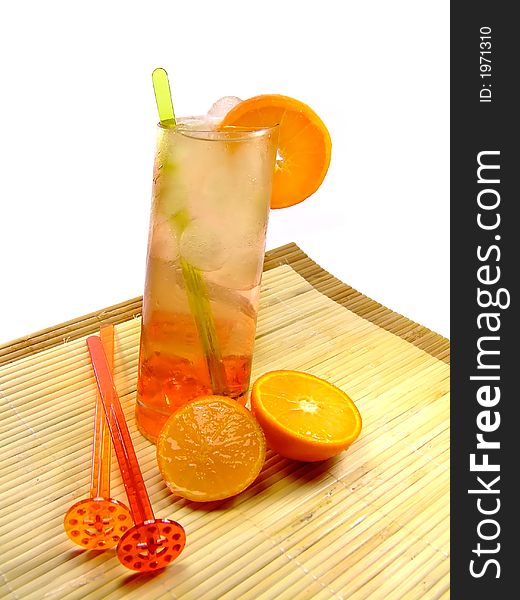 A colorful picture of a cocktail in a longdrink glass with some decoration at the side. A colorful picture of a cocktail in a longdrink glass with some decoration at the side