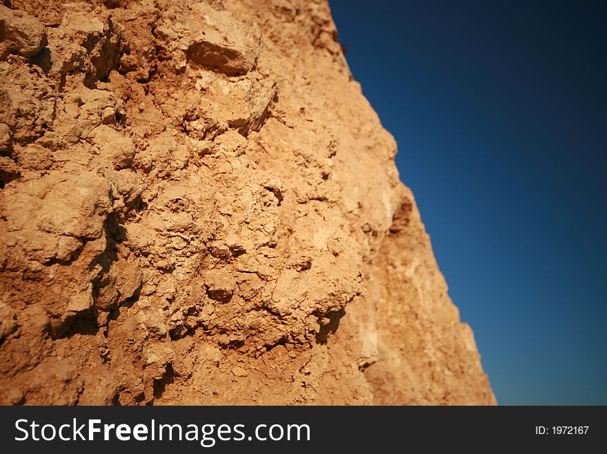 Rocky mountain on a blue sky. Rocky mountain on a blue sky