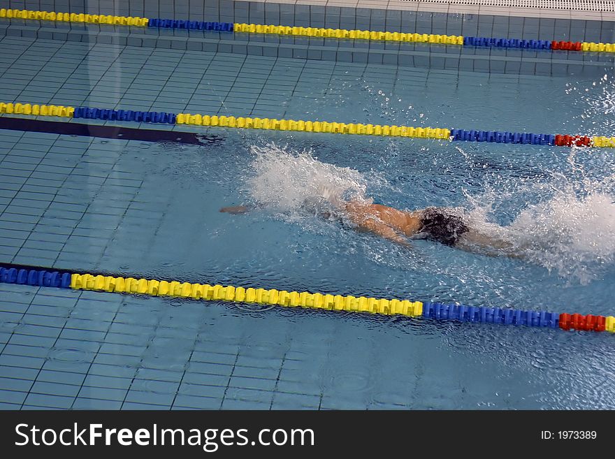 A swimmer in a swimming pool spa