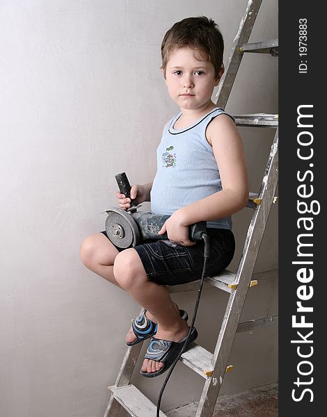 Boy with palette-knife near a ladder