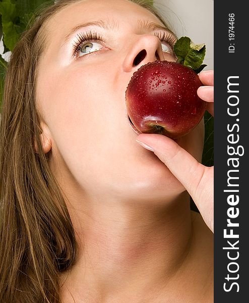 Beautiful young woman portrait with apple. Beautiful young woman portrait with apple