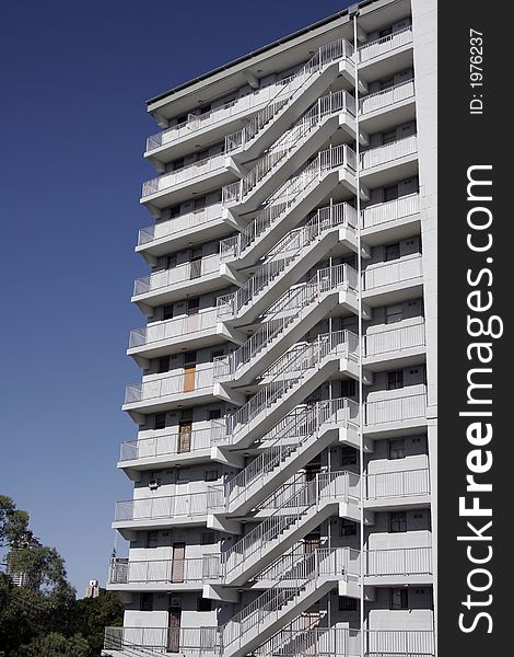 Modern Tall White Urban Residential Apartment Building In Sydney, Stairs, Staircase, Australia. Modern Tall White Urban Residential Apartment Building In Sydney, Stairs, Staircase, Australia