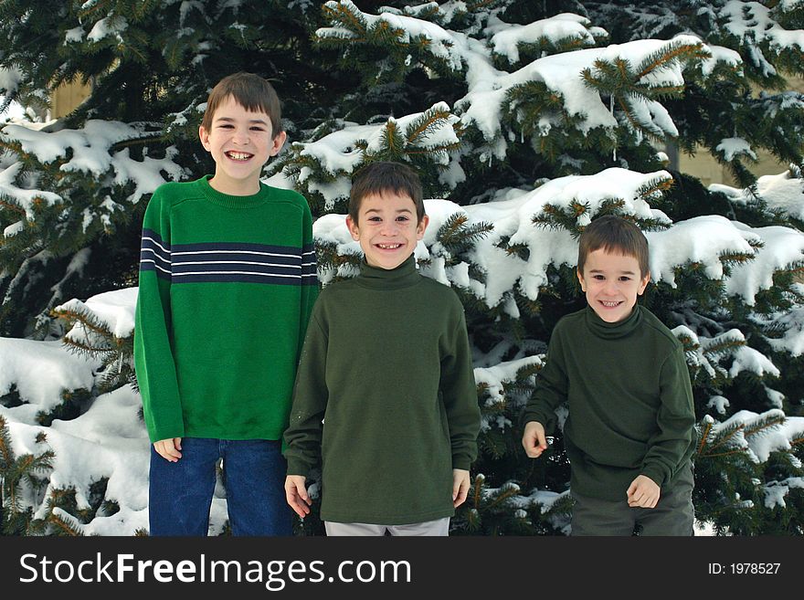 Three Boys having fun outside in the cold. Three Boys having fun outside in the cold