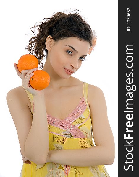 Beautiful woman with oranges